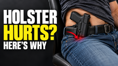 Close-up of a seated man wearing a holstered handgun inside his waistband, with a red arrow highlighting a pressure point and text reading “Holster Hurts? Here’s Why.”